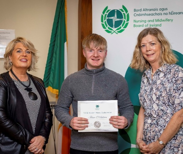 A group of people posing for a photoDescription automatically generated