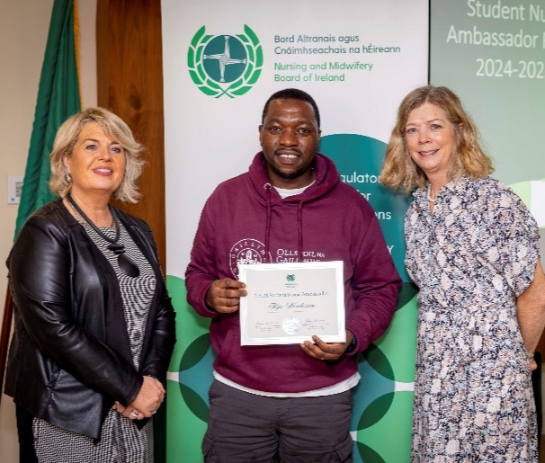 A group of people posing for a photoDescription automatically generated