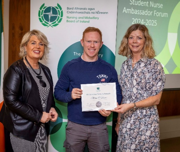 A group of people posing for a photoDescription automatically generated