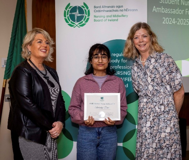 A group of people posing for a photoDescription automatically generated