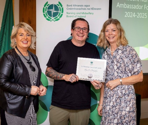 A group of people posing for a photoDescription automatically generated