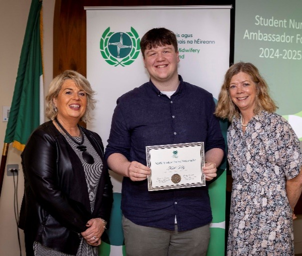 A group of people posing for a photoDescription automatically generated